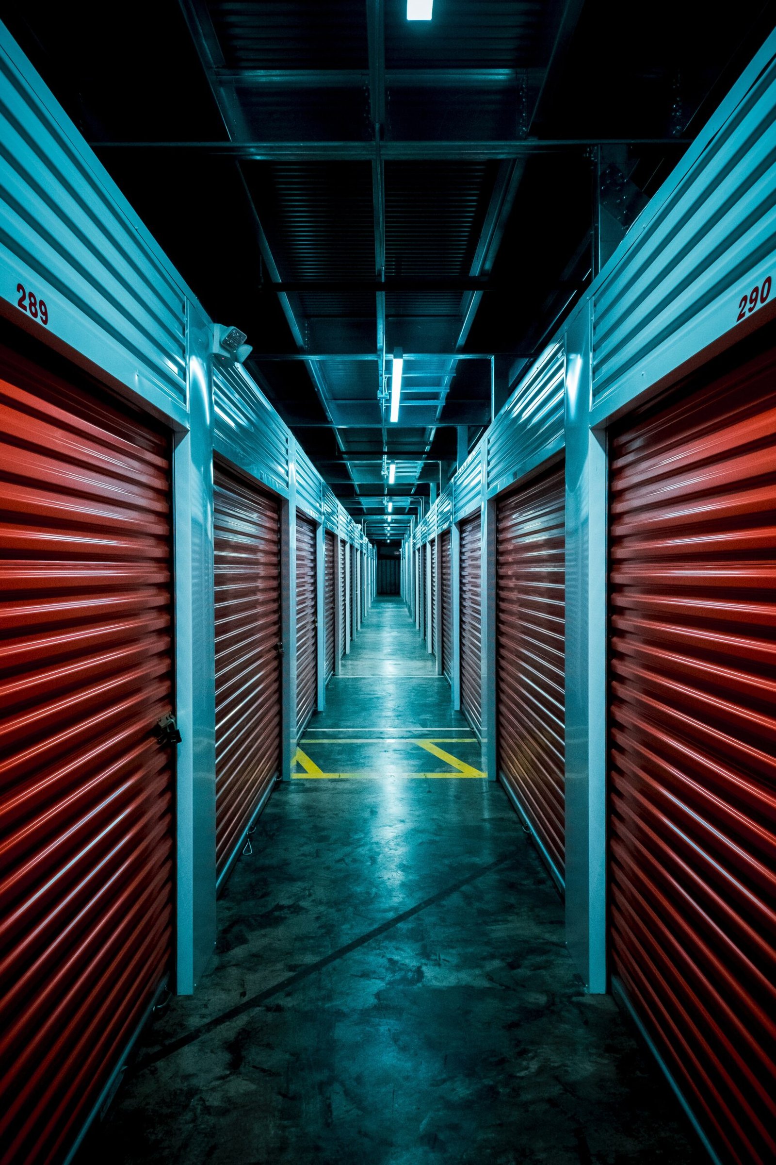 red and gray tunnel with red metal wall